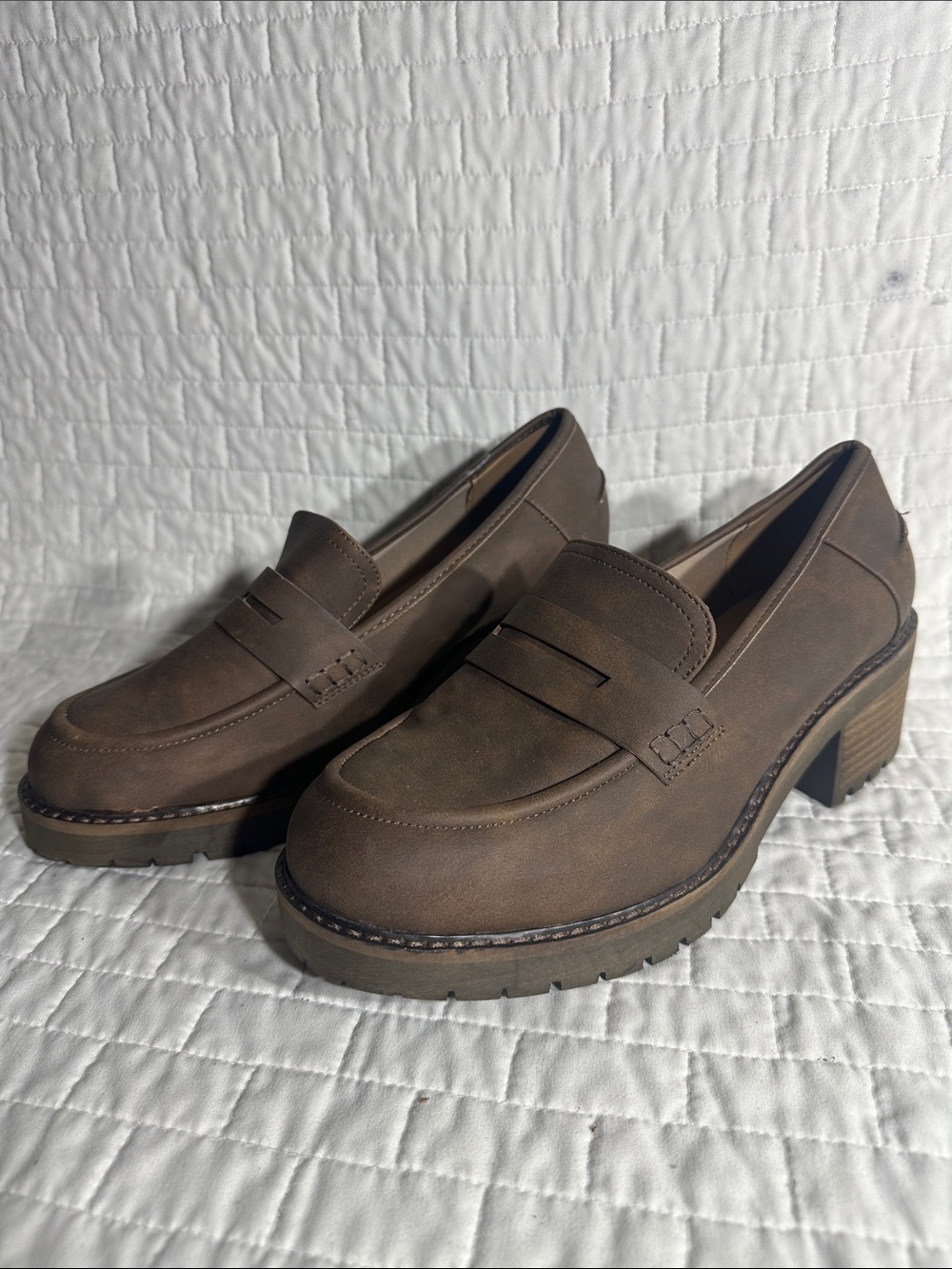 Lane Bryant penny loafers featuring a chunky stacked heel and lug sole